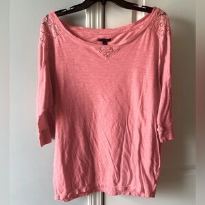 American Eagle Salmon/pinky color tip with lace accents. 3/4 sleeve length